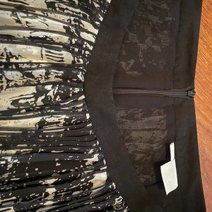 Wonderful airy pin pleated skirt.
